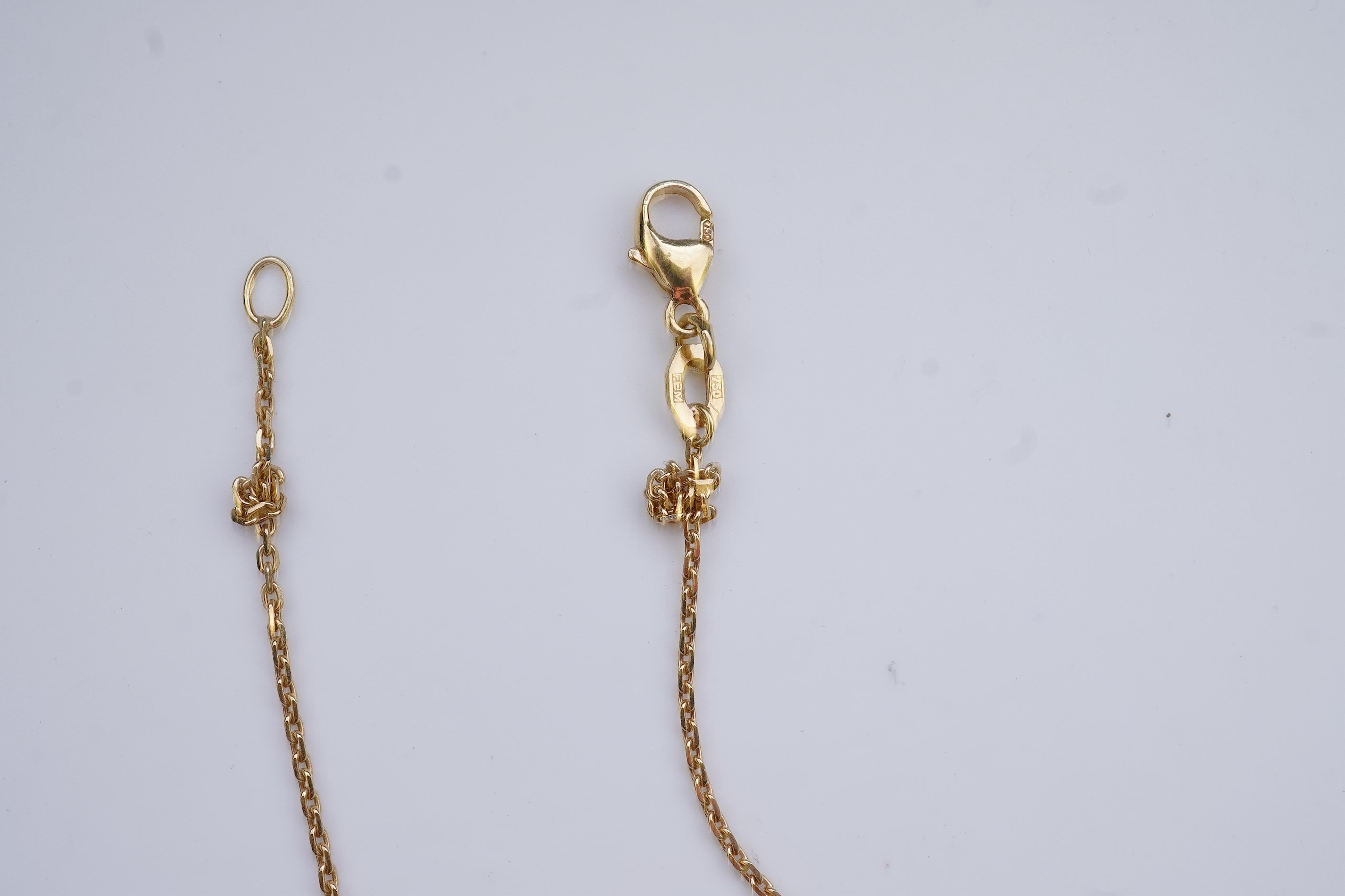A sapphire and diamond pendant